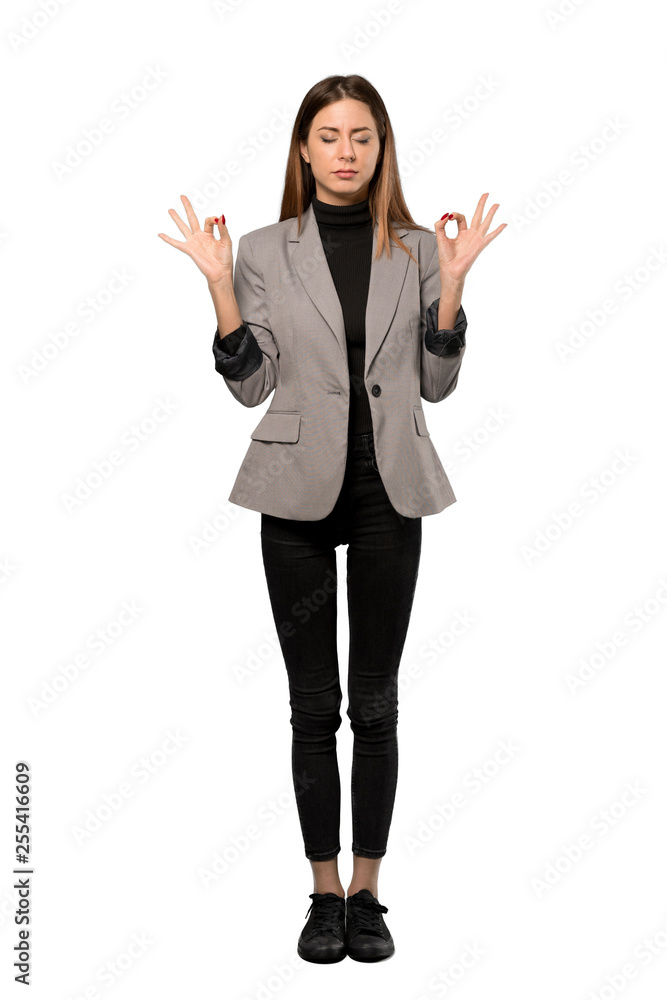 A full-length shot of a Business woman in zen pose over isolated white background A full-length shot of a Business woman in zen pose over isolated white background