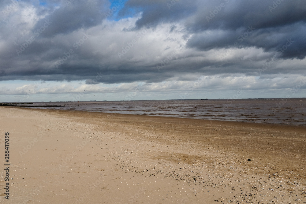 Moody sky beach Moody sky beach