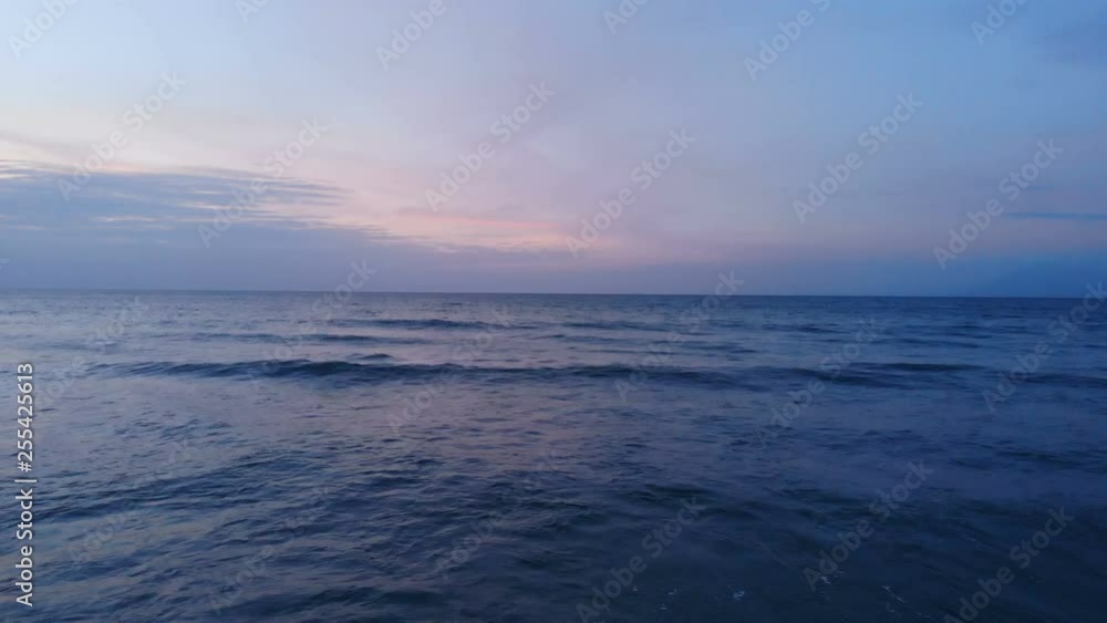 Fly over sea at sunset on Long Beach, San Vincente, Philippines Fly over sea at sunset on Long Beach, San Vincente, Philippines