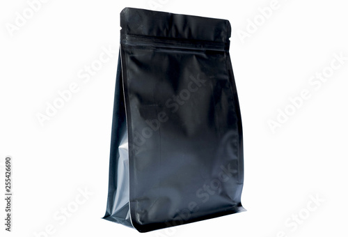 matt black flat bottom coffee pouch with zipper filled with coffee beans on white background fron view