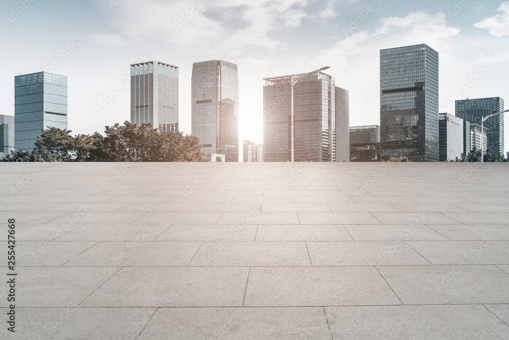 Urban skyscrapers with empty square floor tiles