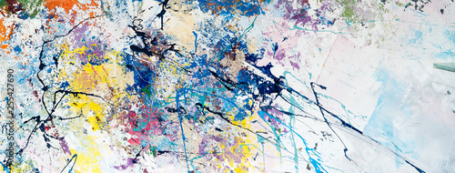 Multicolored abstraction of splashes of acrylic paints. On a white background photo