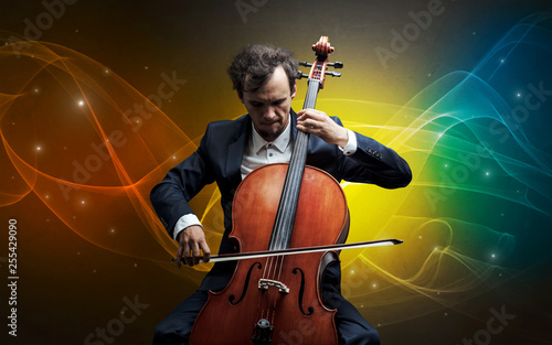 Serious classical cellist with fabled sparkling wallpaper
