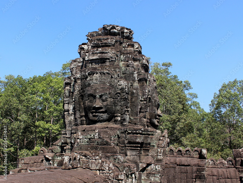 Fragment of the Bayon temple with stone faces, Angkor Thom, Cambodia