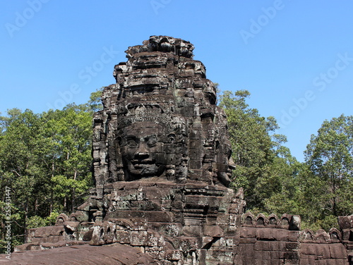 Fragment of the Bayon temple with stone faces, Angkor Thom, Cambodia