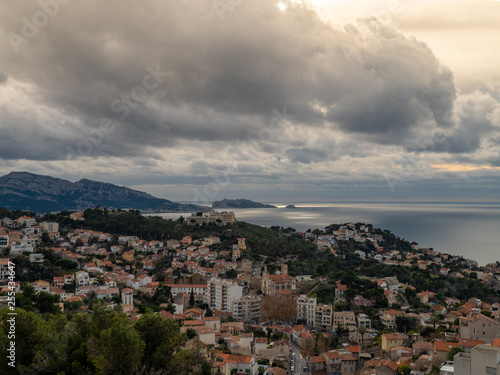 City scape of Marseille and the sea from hill of Notre-Dame de la Garde or,  Catholic basilica in Marseille. © Keerathi