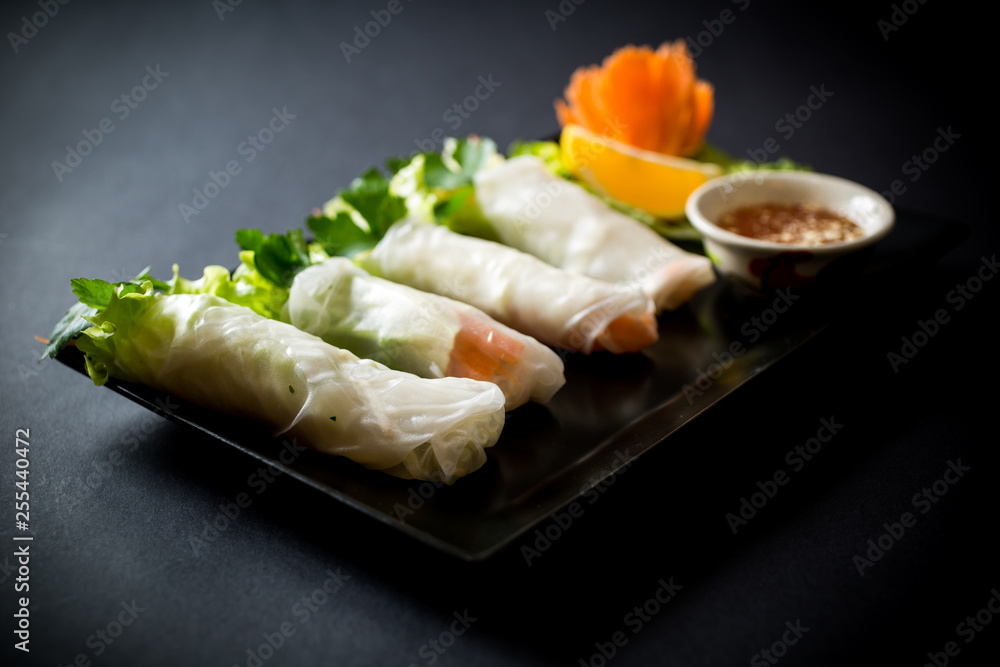 Spring rolls with vegetables in noodle tube. Vegetables in rice noodle tube Spring rolls with vegetables in noodle tube. Vegetables in rice noodle tube