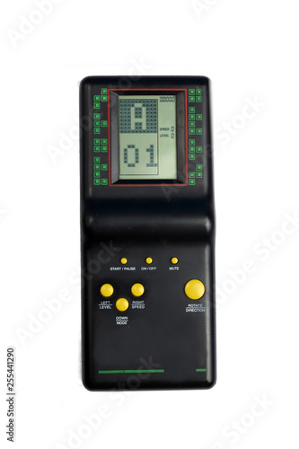 Black tetris game console isolated on white retro 80s and 90s style with yellow buttons game from childhood