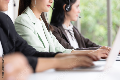 women working in call center. © eggeeggjiew