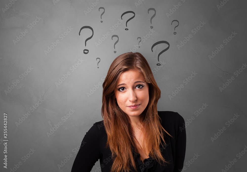 Person with question marks around face
Person with question marks around face