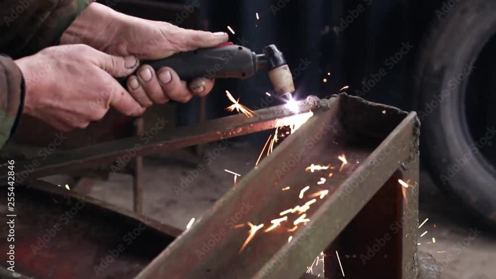 Cutting steel with plasma. Male welder cuts metal plasma. Cutting steel with plasma. Male welder cuts metal plasma.