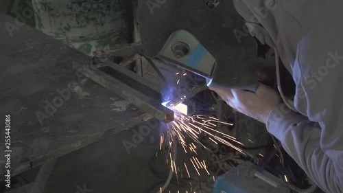 Man welding steel frame