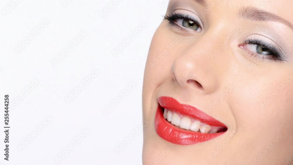 CLoseup face of an young woman with red lips. Sexy beautiful woman is sending air kiss. Full Hd footage. CLoseup face of an young woman with red lips. Sexy beautiful woman is sending air kiss. Full Hd footage.