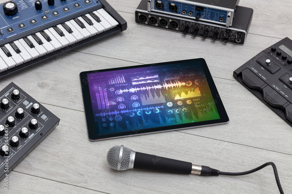 Electronic music instruments, microphone, piano, consoles and tablet with reports concept
Electronic music instruments, microphone, piano, consoles and tablet with reports concept