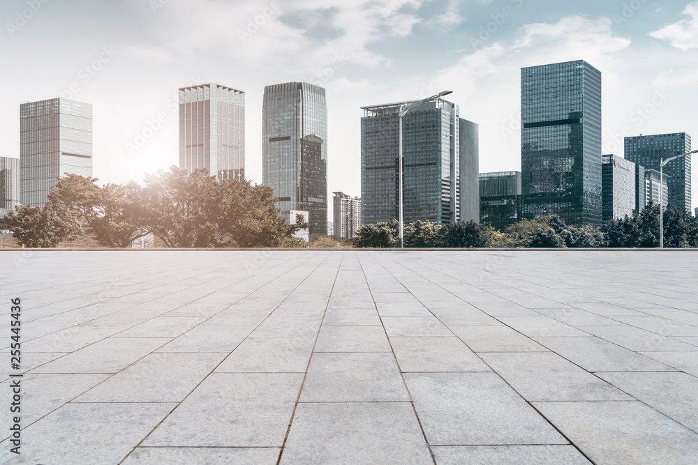 Urban skyscrapers with empty square floor tiles