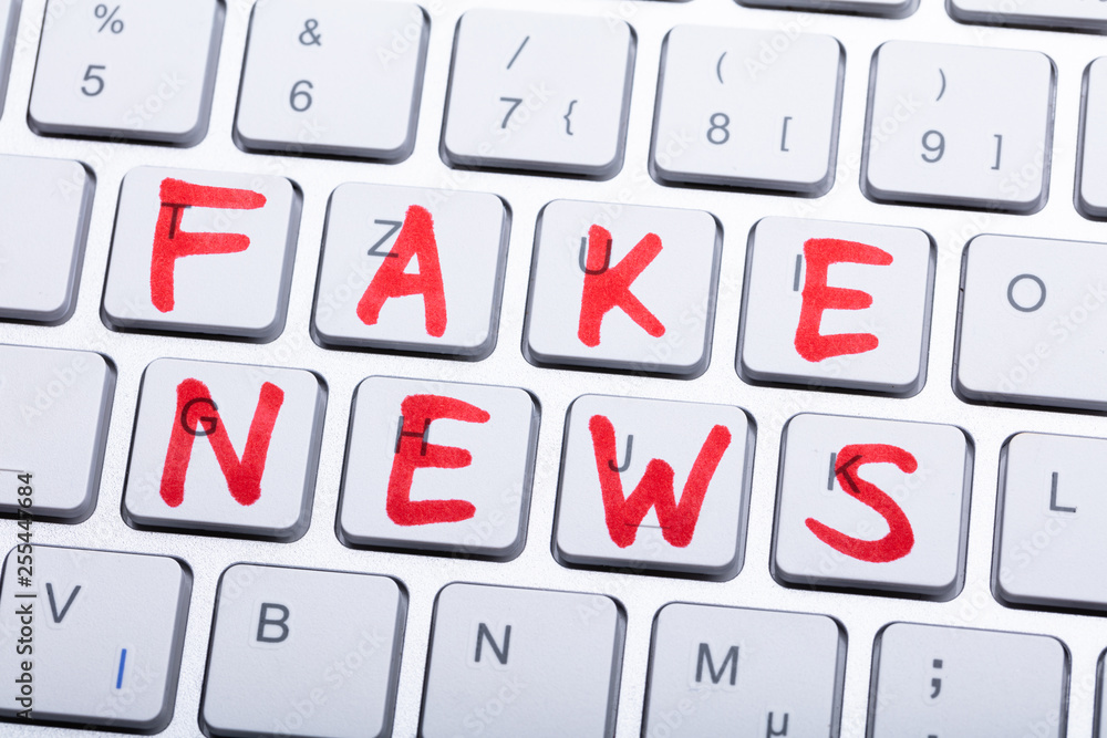 Words Fake News Written On A Keyboard Words Fake News Written On A Keyboard