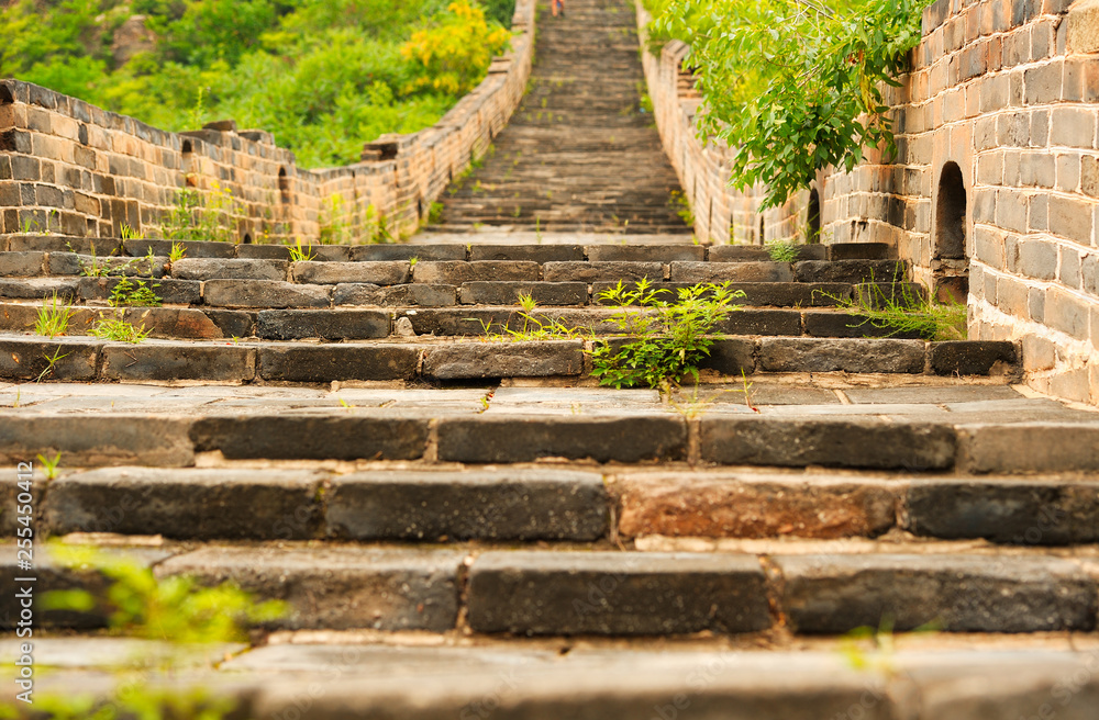 Ancient stairway. Closeup at steps being part of Great Wall, famous fortification and touristic spot in China, close to Beijing. Ancient stairway. Closeup at steps being part of Great Wall, famous fortification and touristic spot in China, close to Beijing.