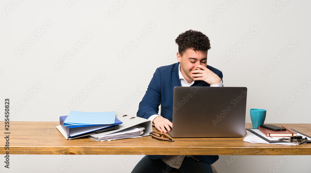 Business man in a office smiling a lot Business man in a office smiling a lot