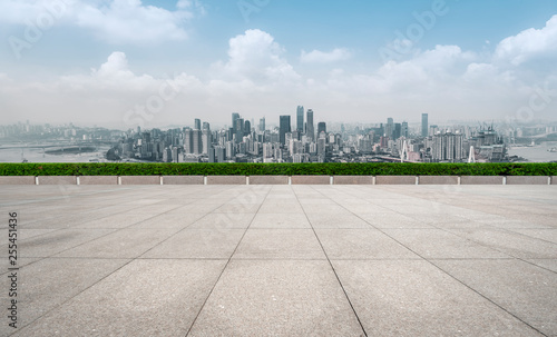 Urban skyscrapers with empty square floor tiles