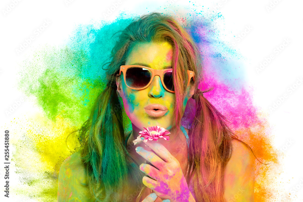 Beautiful woman covered in rainbow colored powder. Holi colors festival Beautiful woman covered in rainbow colored powder. Holi colors festival