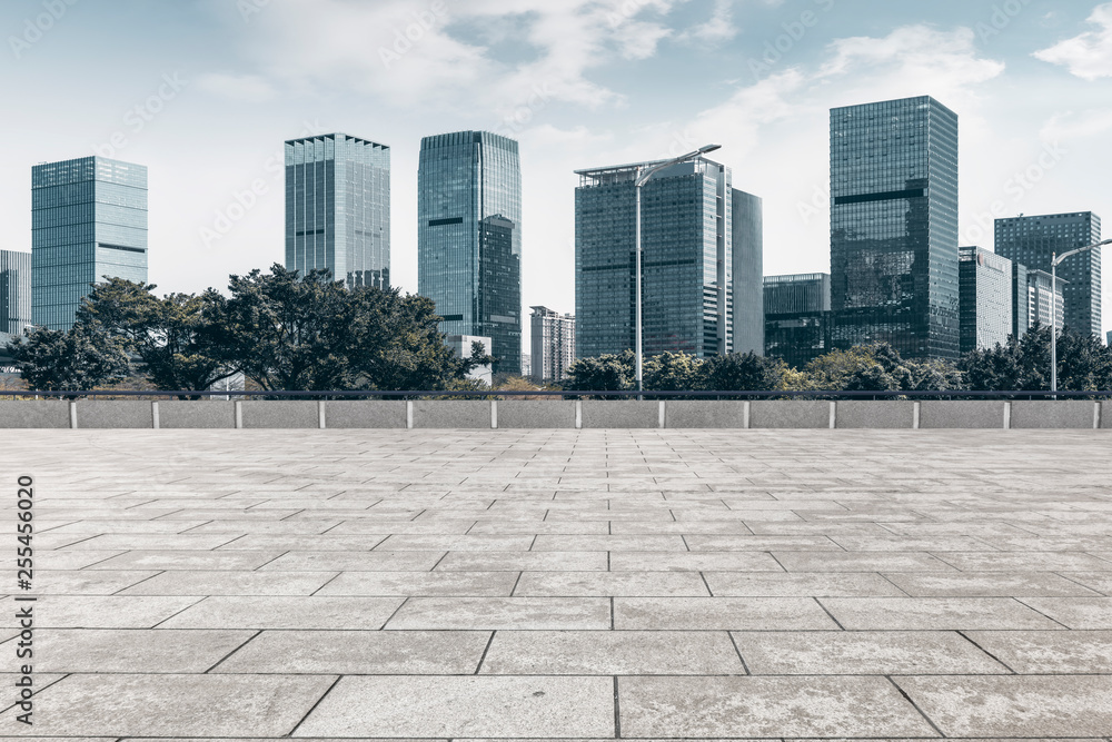 Urban skyscrapers with empty square floor tiles Urban skyscrapers with empty square floor tiles