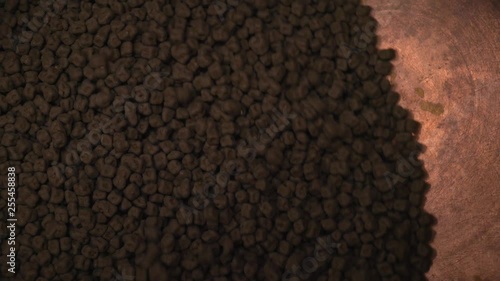 Chocolates on production. Large capacity for mixing sweets. chocolate factory. The gradual production of handmade chocolate.