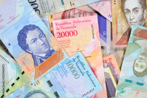 Venezuela bolivar banknotes, different value. Beautiful colorful obverse side bolivares close up background. photo