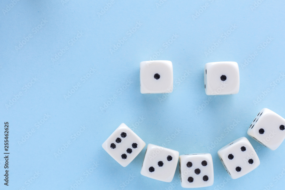 White gaming dices on light blue background. victory chance, lucky. Flat lay, place for text. Top view. Close-up. Concept gamble. spectacular pastel White gaming dices on light blue background. victory chance, lucky. Flat lay, place for text. Top view. Close-up. Concept gamble. spectacular pastel
