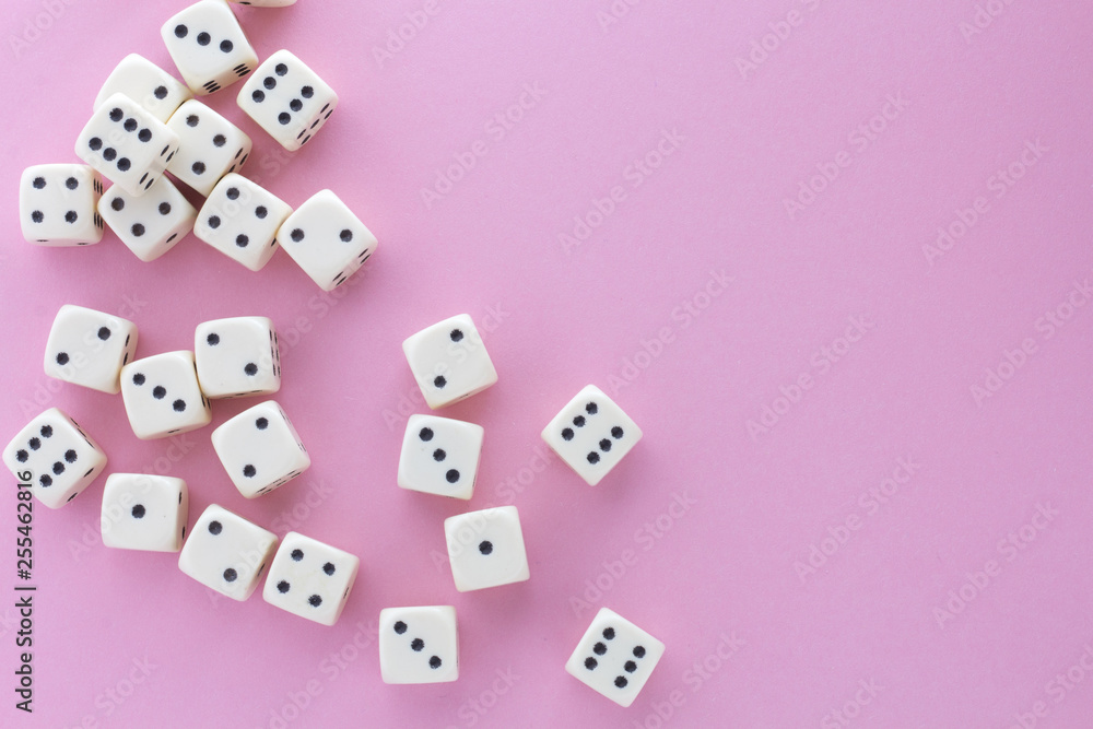 White gaming dices on violet background. victory chance, lucky. Flat lay, place for text. Top view. Close-up. Concept gamble. spectacular pastel White gaming dices on violet background. victory chance, lucky. Flat lay, place for text. Top view. Close-up. Concept gamble. spectacular pastel