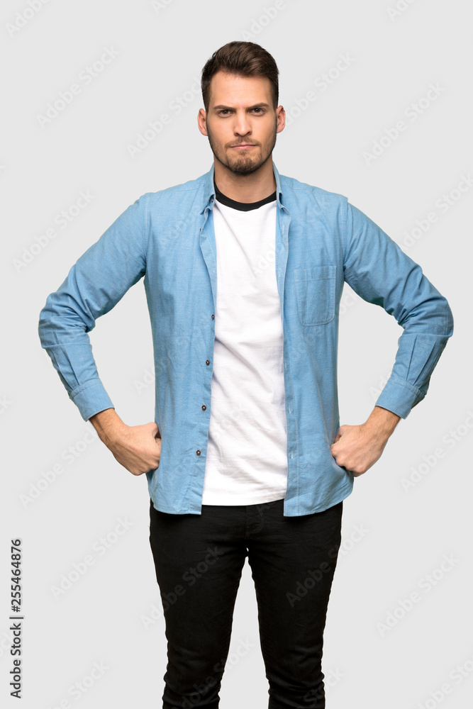 Fototapeta premium Handsome man angry over grey background