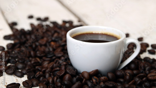 Coffee cup and coffee beans © Emil