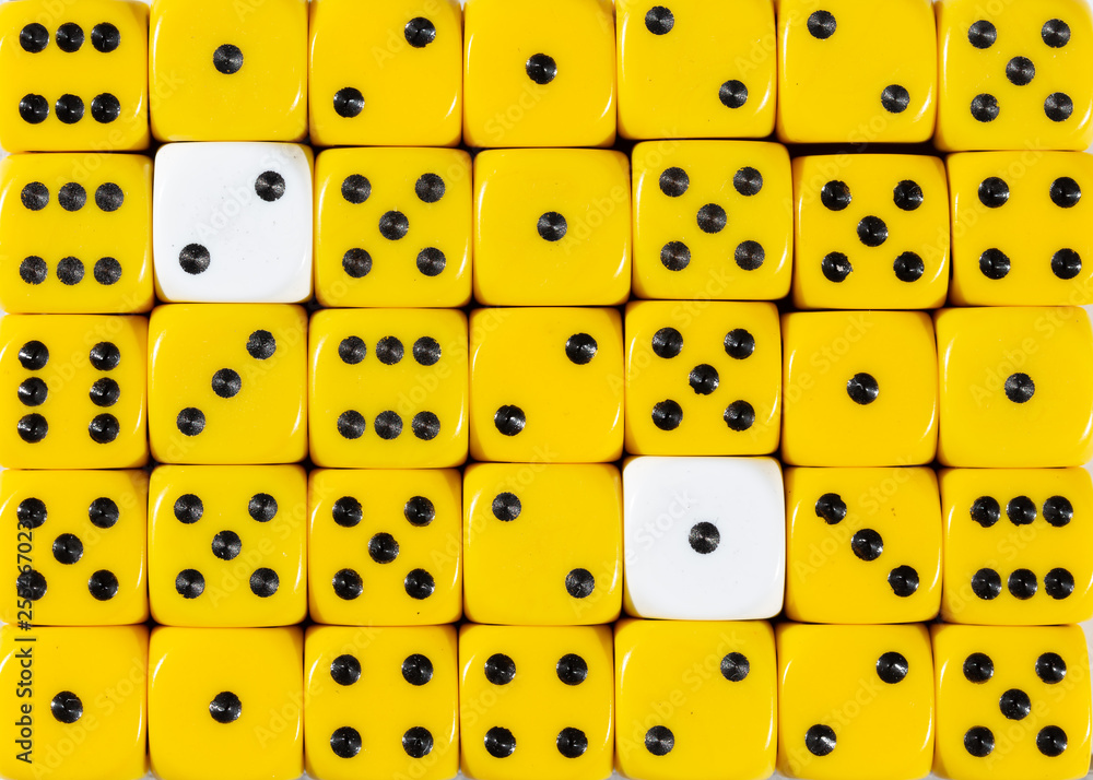 Background of random ordered yellow dices with two white cubes Background of random ordered yellow dices with two white cubes