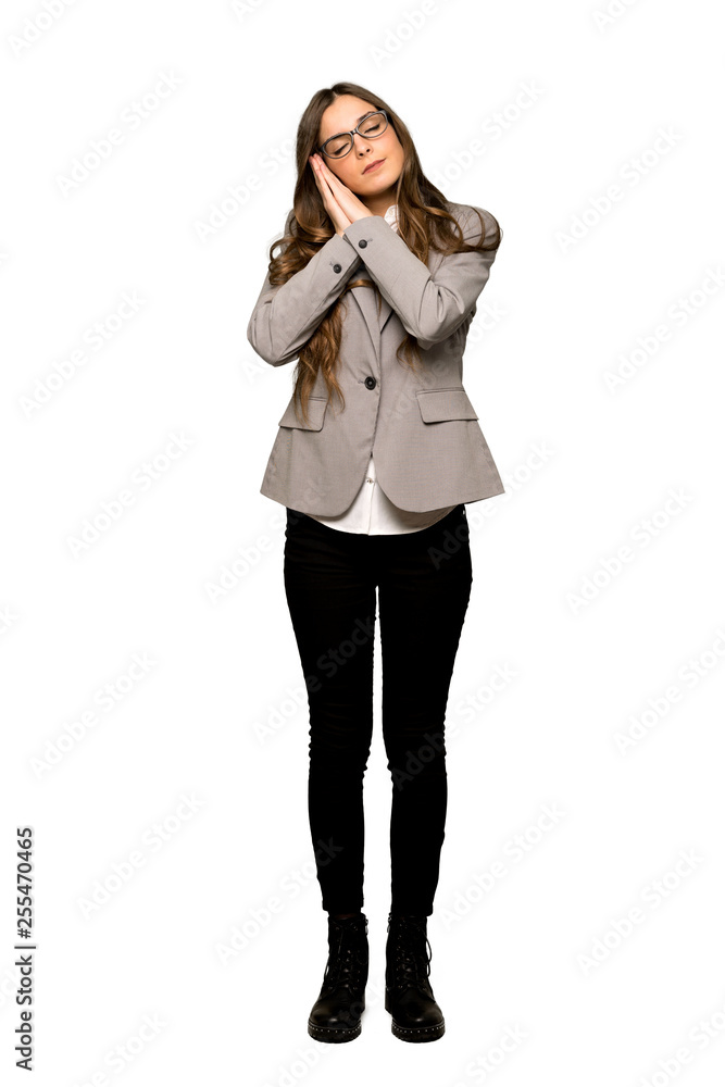 Fototapeta premium Full-length shot of Business woman making sleep gesture in dorable expression on isolated white background