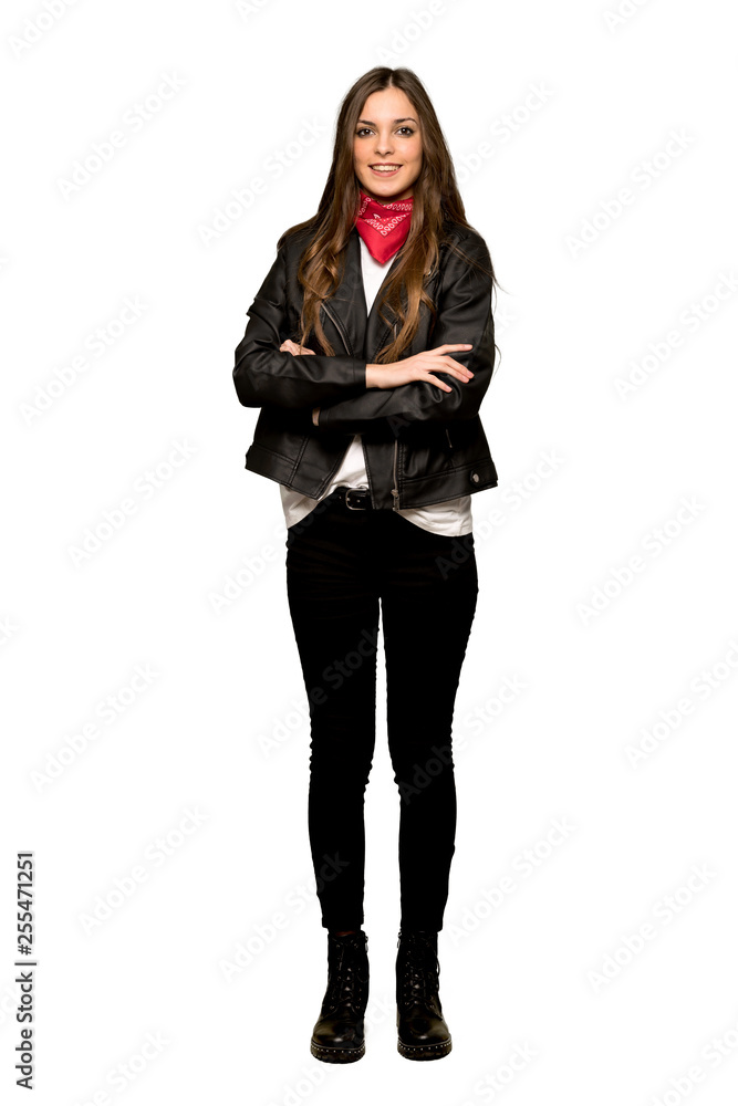Full-length shot of Young woman with leather jacket keeping the arms crossed in frontal position on isolated white background Full-length shot of Young woman with leather jacket keeping the arms crossed in frontal position on isolated white background