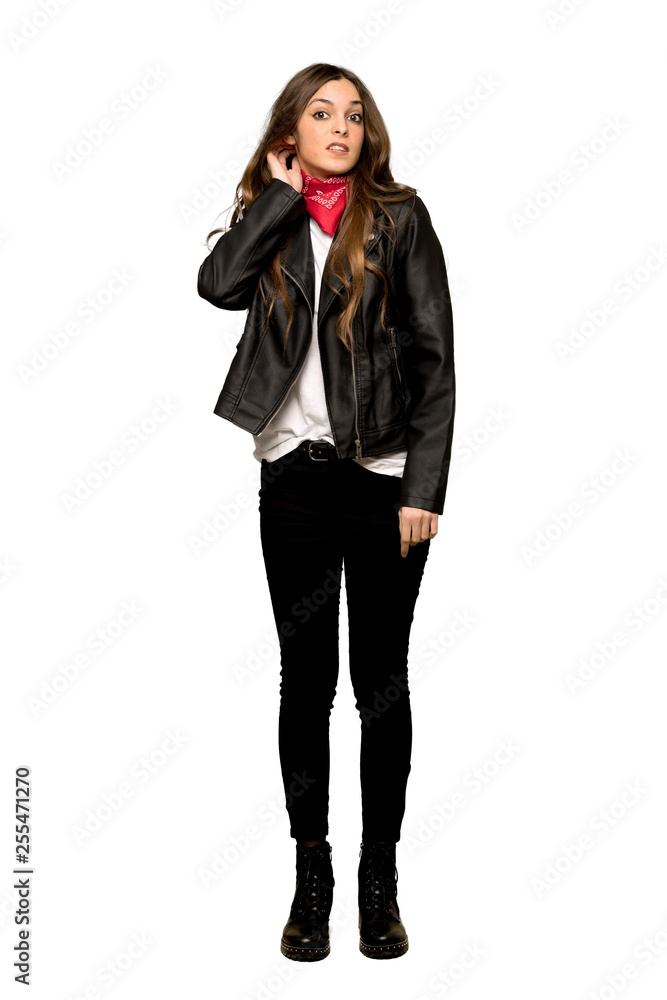 Full-length shot of Young woman with leather jacket having doubts on isolated white background Full-length shot of Young woman with leather jacket having doubts on isolated white background