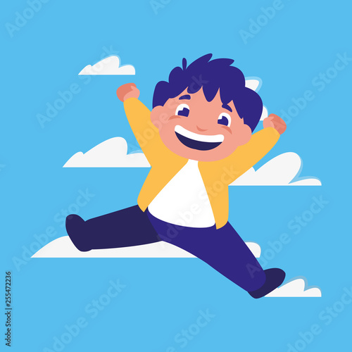happy boy jumping clouds background
