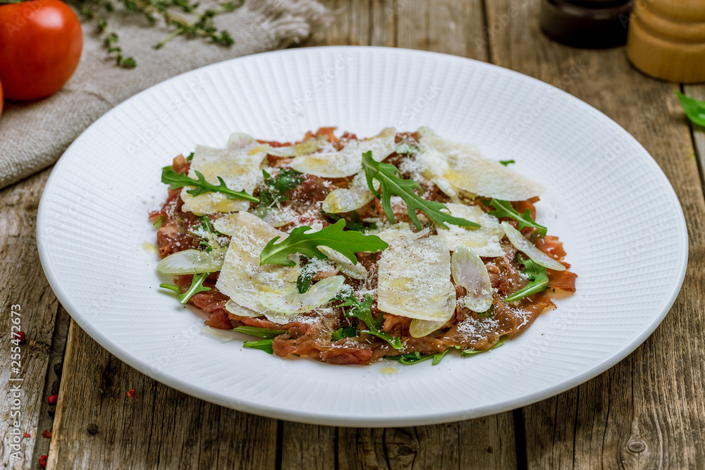 Beef carpaccio with Parmesan and arugula Beef carpaccio with Parmesan and arugula