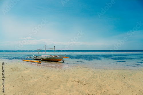 boat on the beach © Apple
