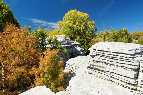 Stone forest, natural rock formation, created by multiple layers of stone, located near Monodendri village in Zagori region, Northern Greece. photo