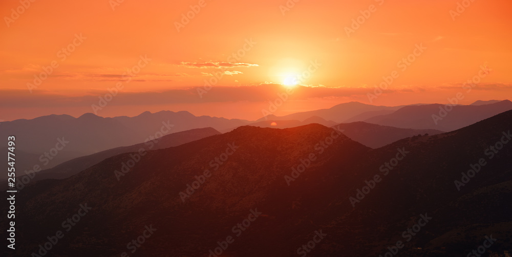 Beautiful sunset colors over the mountains of Peloponnese, Greece.