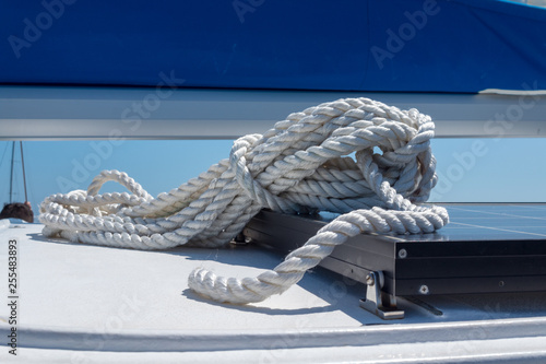 closeup on sailing rope. detail shot on coiled rope ready to set sail