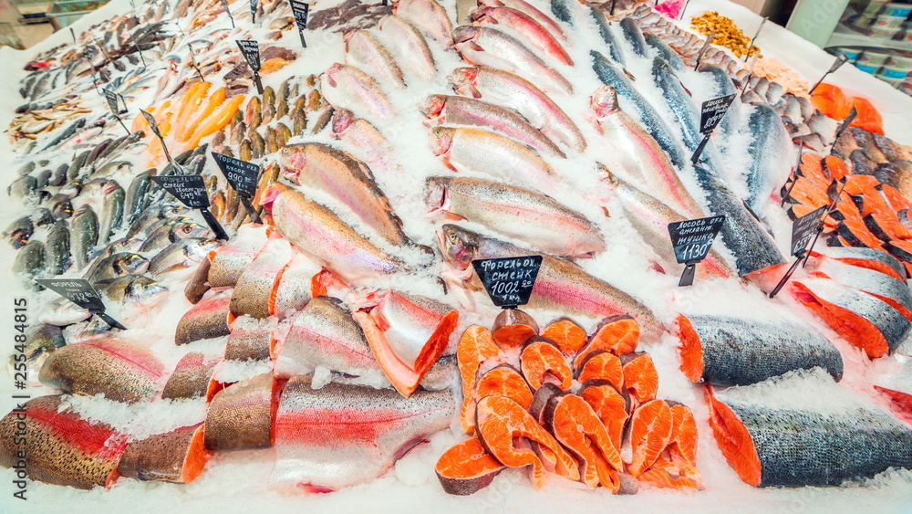 Αυτοκόλλητο a large selection of fresh fish lying in the ice on the counter of the supermarket