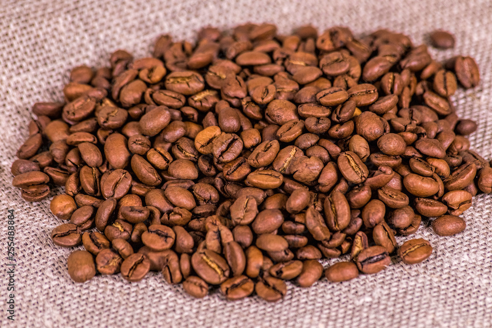 Fototapeta premium Coffee beans on cloth