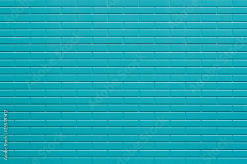 Blue painted brick wall texture and background