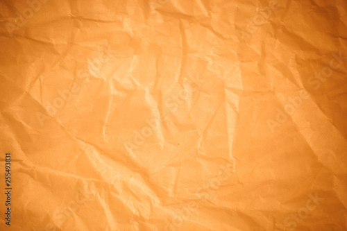 Brown crumpled paper background.