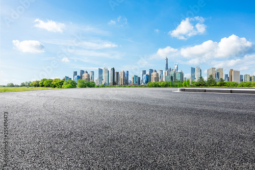 Shanghai city skyline and famous landmark buildings with empty asphalt road ground