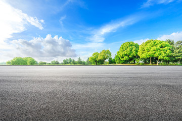 Asphalt road ground and green woods in the countryside nature park