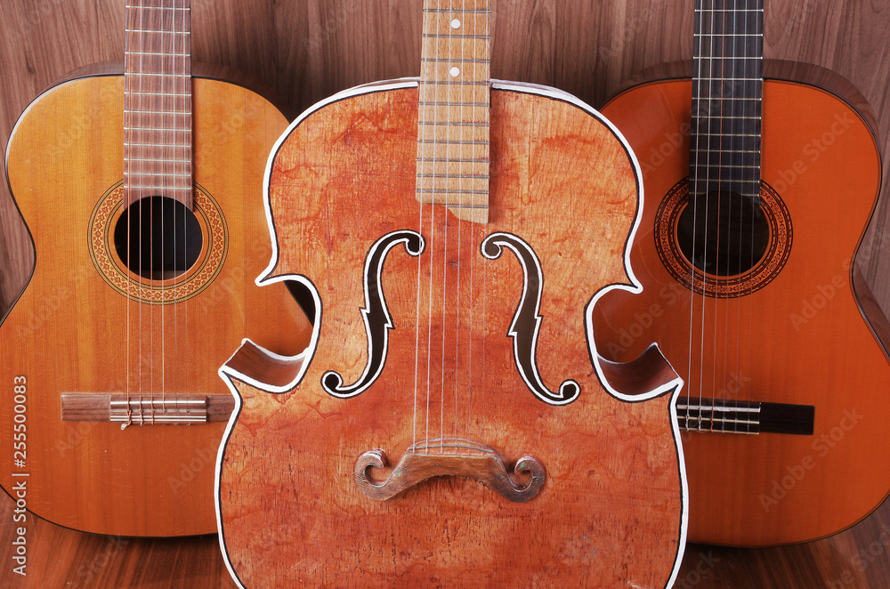 Fototapeta premium Three vintage acoustic guitars.