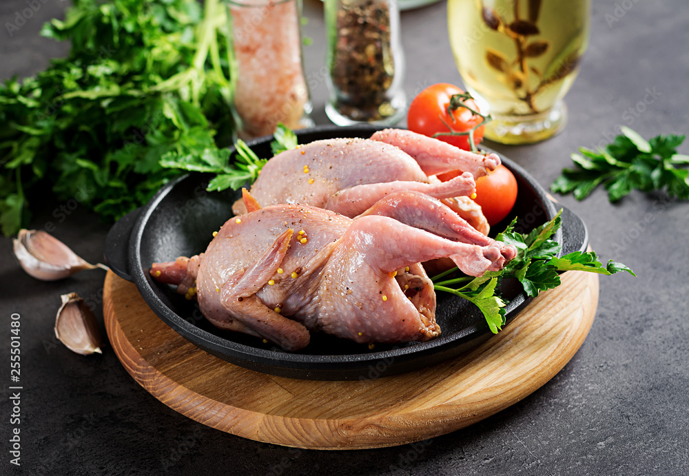 Raw uncooked quail. Ingredients for cooking healthy meat dinner. Raw uncooked quail. Ingredients for cooking healthy meat dinner.
