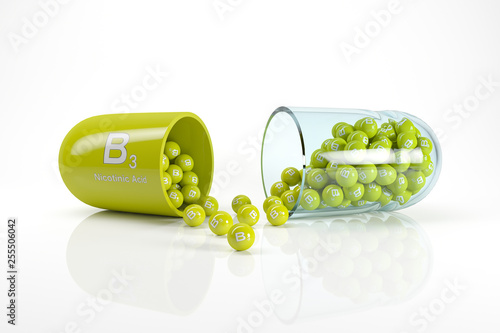 3d rendering of a vitamin capsule with vitamin B3 - nicotinic acid photo